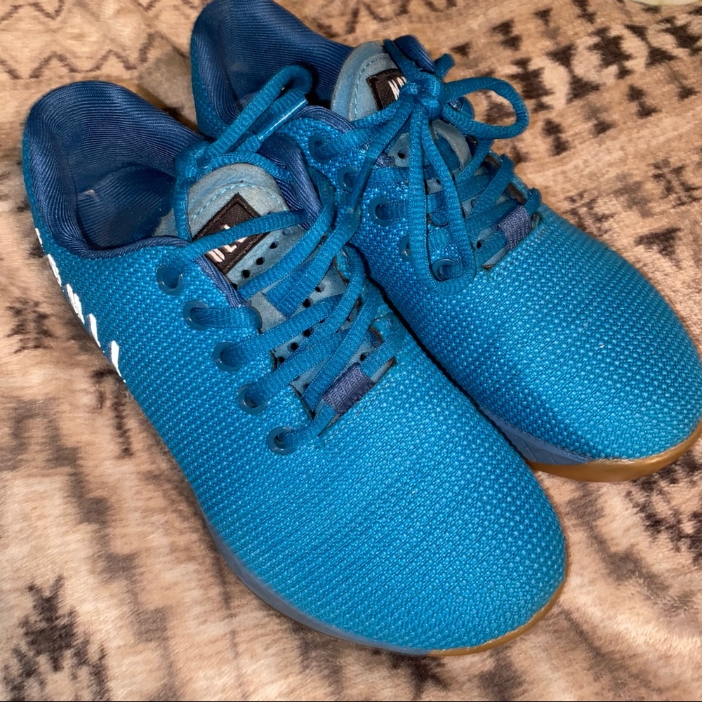 Turquoise Nobull trainers with gym drop bottom